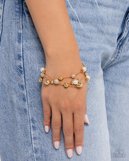 Classy Cruise - Gold - Paparazzi Bracelet Image