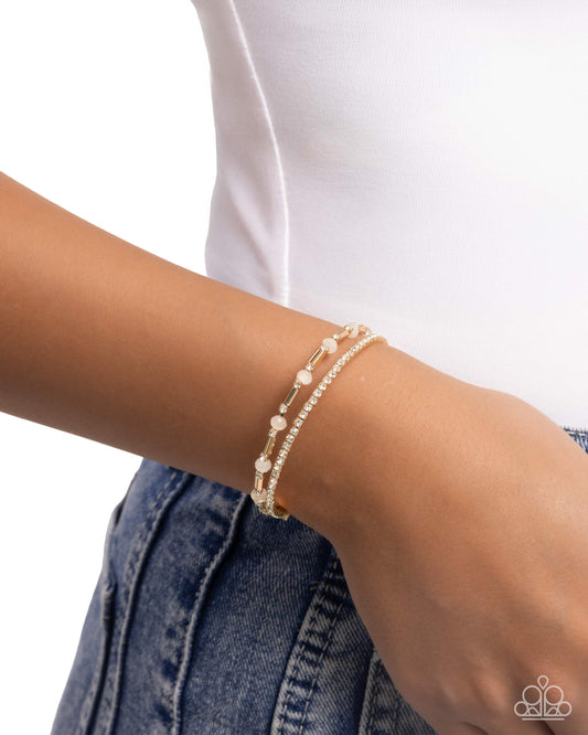 Publicity Pizzazz - Gold - Paparazzi Bracelet Image
